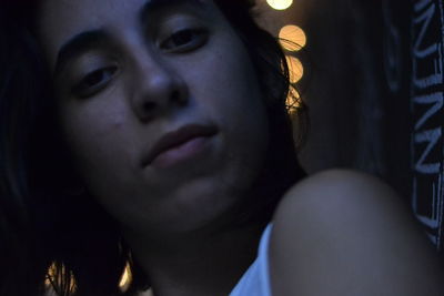 Close-up portrait of woman looking away