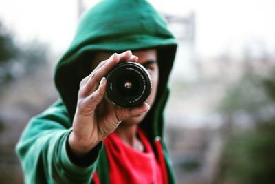 Close-up of hand holding camera