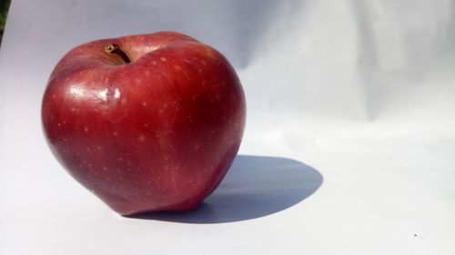 Close-up of apple against white background