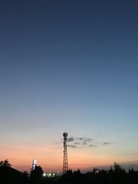 Silhouette tower against sky during sunset