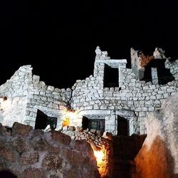 Ancient structure at night