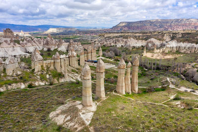 View of old ruins against cloudy sky