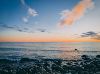 Scenic view of sea against sky during sunset