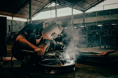 People working in factory