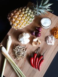 High angle view of vegetables on cutting board