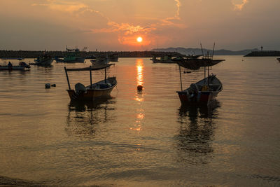 Scenic view of sea at sunset