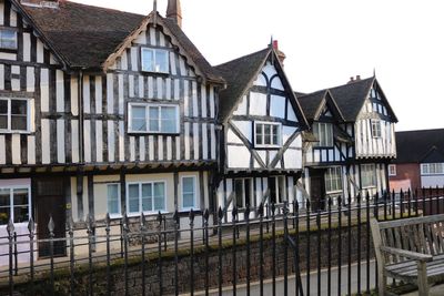 Houses against sky in city