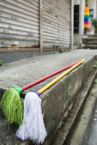 Close-up of umbrella on wet wall