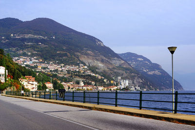 City by sea against sky