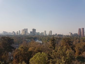 Cityscape against clear sky