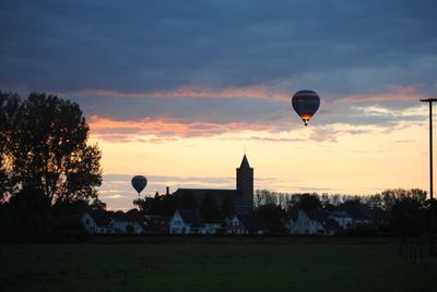 Hot air balloon against sky during sunset