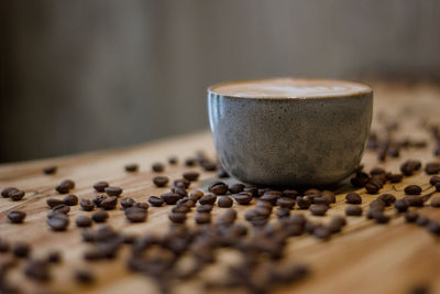 Close-up of coffee cup on table