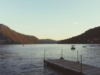 Scenic view of lake with mountains in background