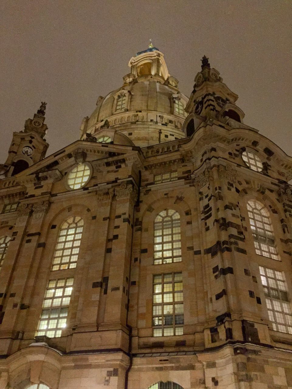LOW ANGLE VIEW OF ILLUMINATED CATHEDRAL