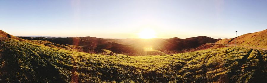 Scenic view of landscape against sky during sunset