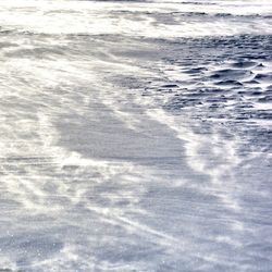 Close-up of snow on beach