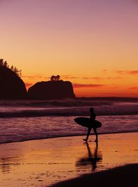 Scenic view of sea at sunset