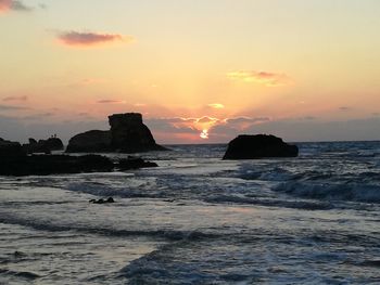 Scenic view of sea against sky during sunset