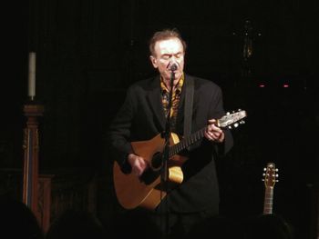 Full length of illuminated woman in dark