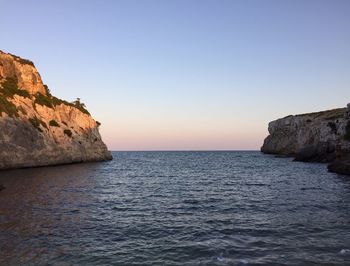 Scenic view of sea against blue sky