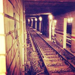 Railroad tracks on railroad station platform