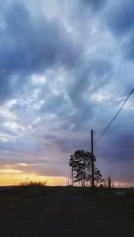 Scenic view of field against sky during sunset