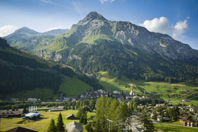 Scenic view of landscape and mountains against sky