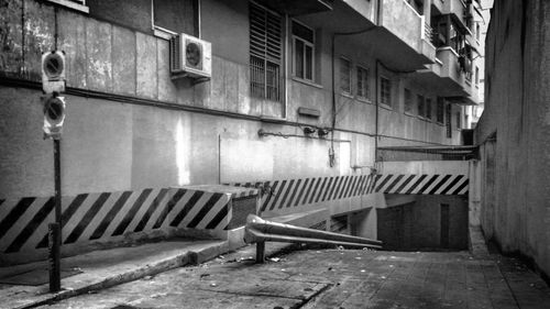 Empty benches along buildings