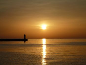 Scenic view of sea during sunset