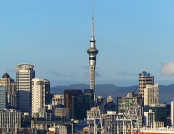 Modern buildings in city against sky