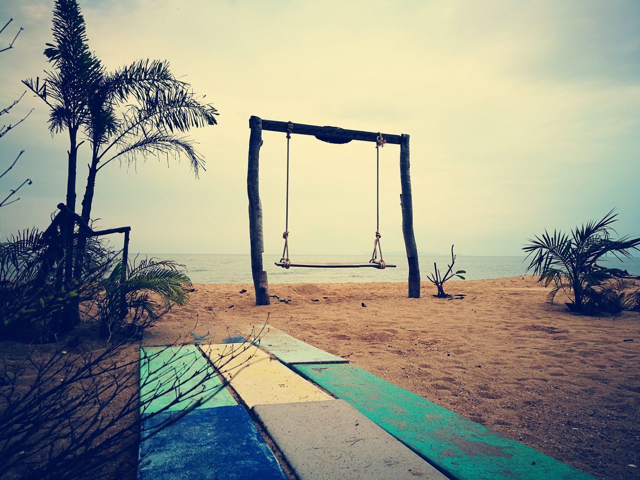 VIEW OF PLAYGROUND AGAINST SKY