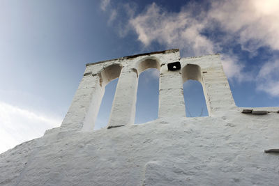 A view of an old church with arch in the island of patmos, greece