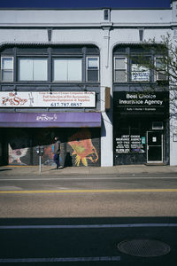 Information sign on road in city