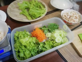 High angle view of chopped vegetables in bowl on table