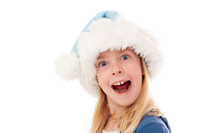 Portrait of cute girl against white background