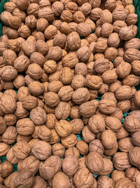 Full frame shot of walnuts for sale at market stall