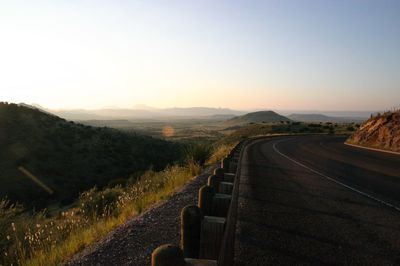 Road amidst landscape against clear sky