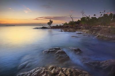 Scenic view of sea against sky during sunset