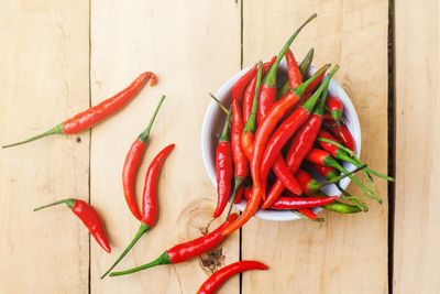 High angle view of red chili peppers on table