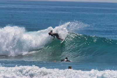 Man surfing in sea