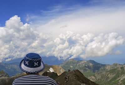 Man in mountains against sky