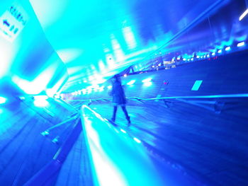 View of illuminated woman at night