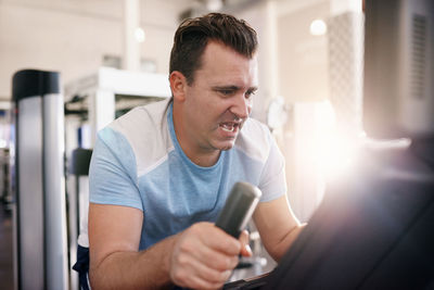 Young man using mobile phone