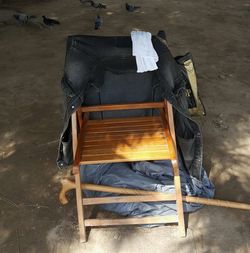 High angle view of empty chair on table