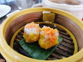 High angle view of fish in plate on table