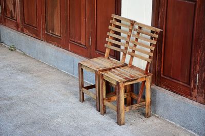 Empty chairs and tables in building