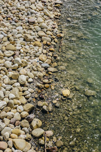 Full frame shot of pebbles at beach