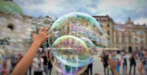 Reflection of woman in bubbles