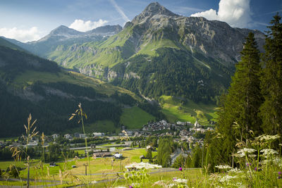 Scenic view of landscape and mountains against sky