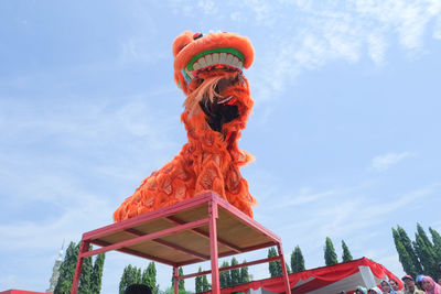 Low angle view of statue against sky